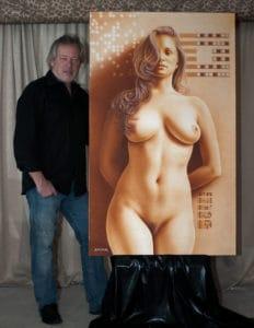 Artist A.D. Cook with TRUTH painting featuring Liz Ashley