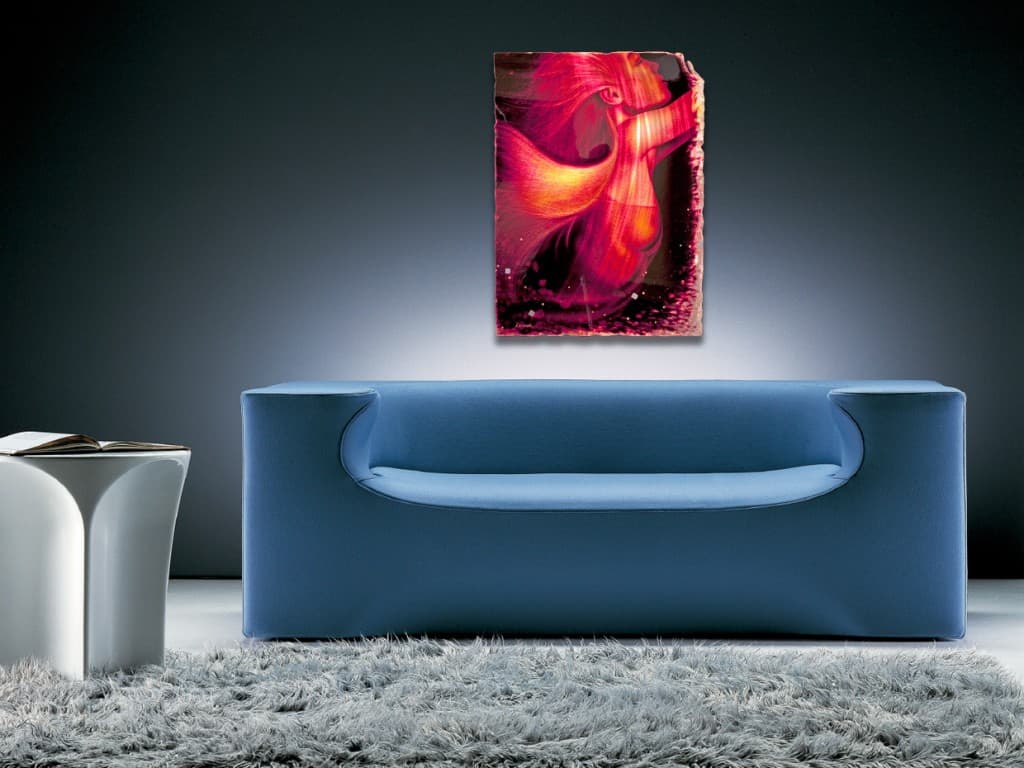SIREN metal art nude by A.D. Cook over blue couch