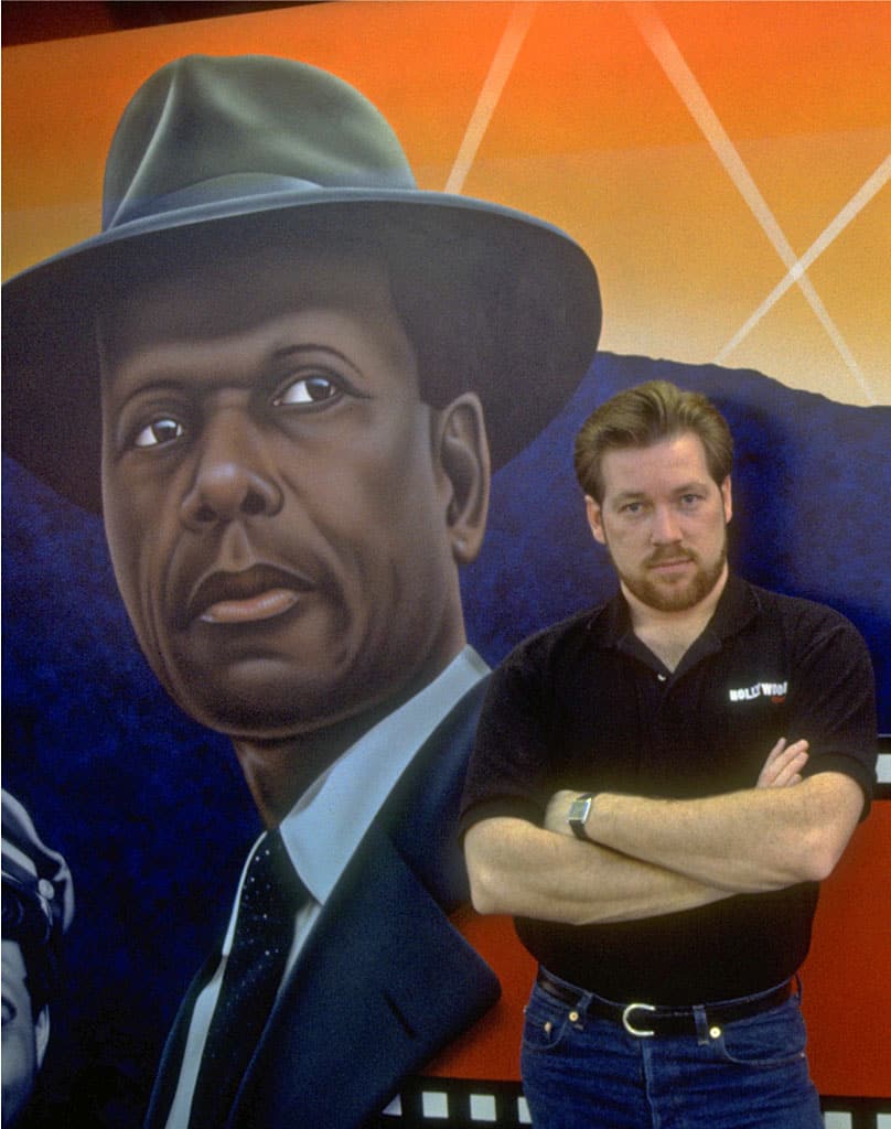 A.D. Cook with Mr. Tibbs wall mural at Hollywood video, Lake Oswego, OR 1991