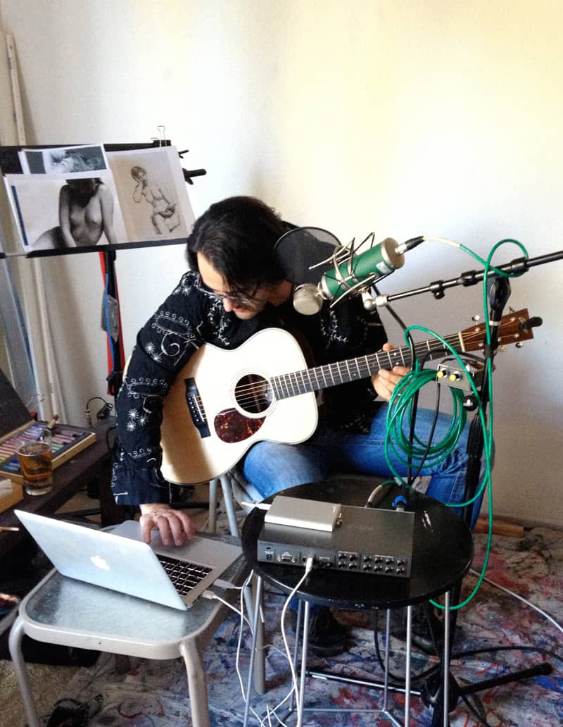 Singer/Musician Tim Catching playing in A.D. Cook art studio, Las Vegas, NV 02/03/13