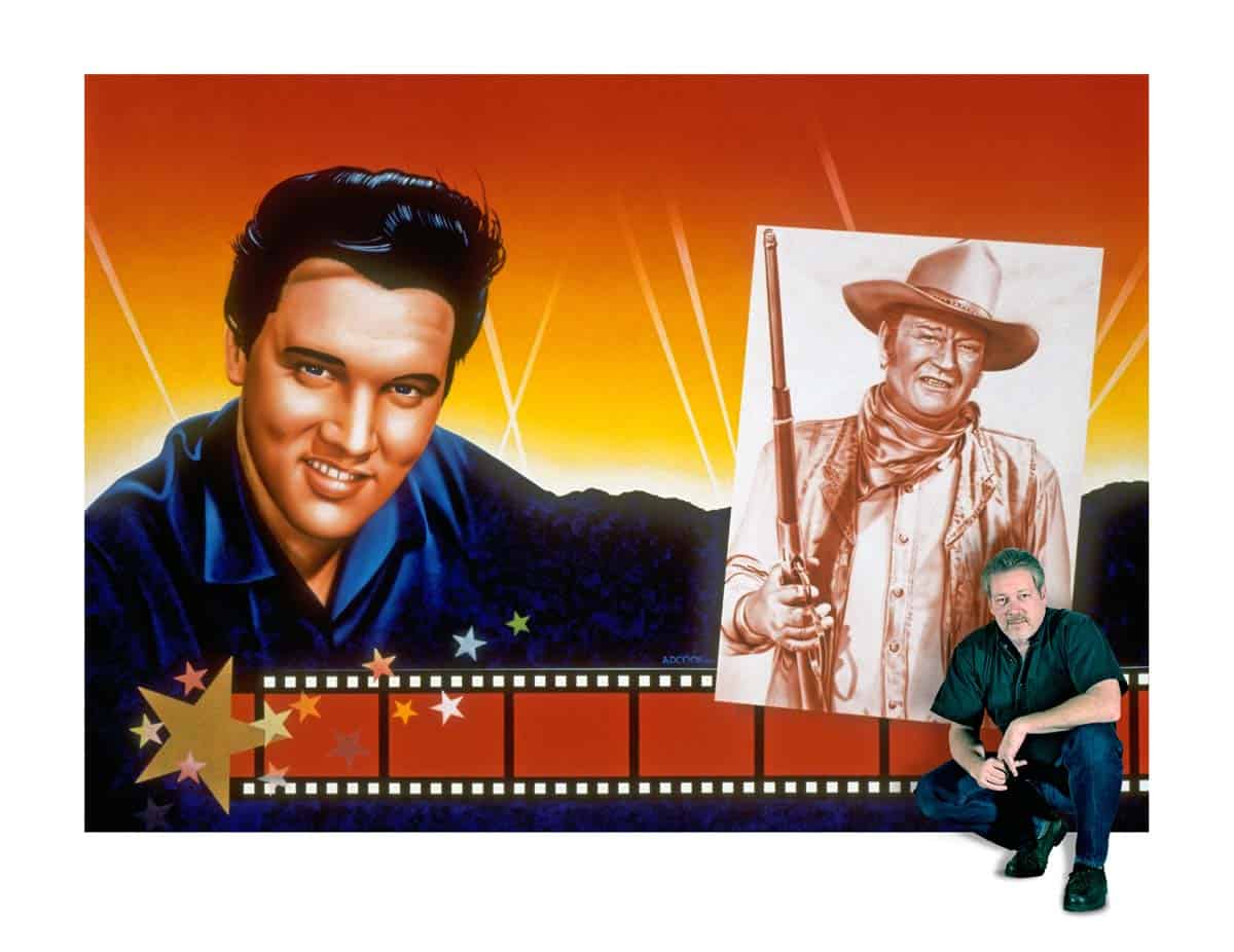 Artist A.D. Cook with Elvis & John Wayne mural