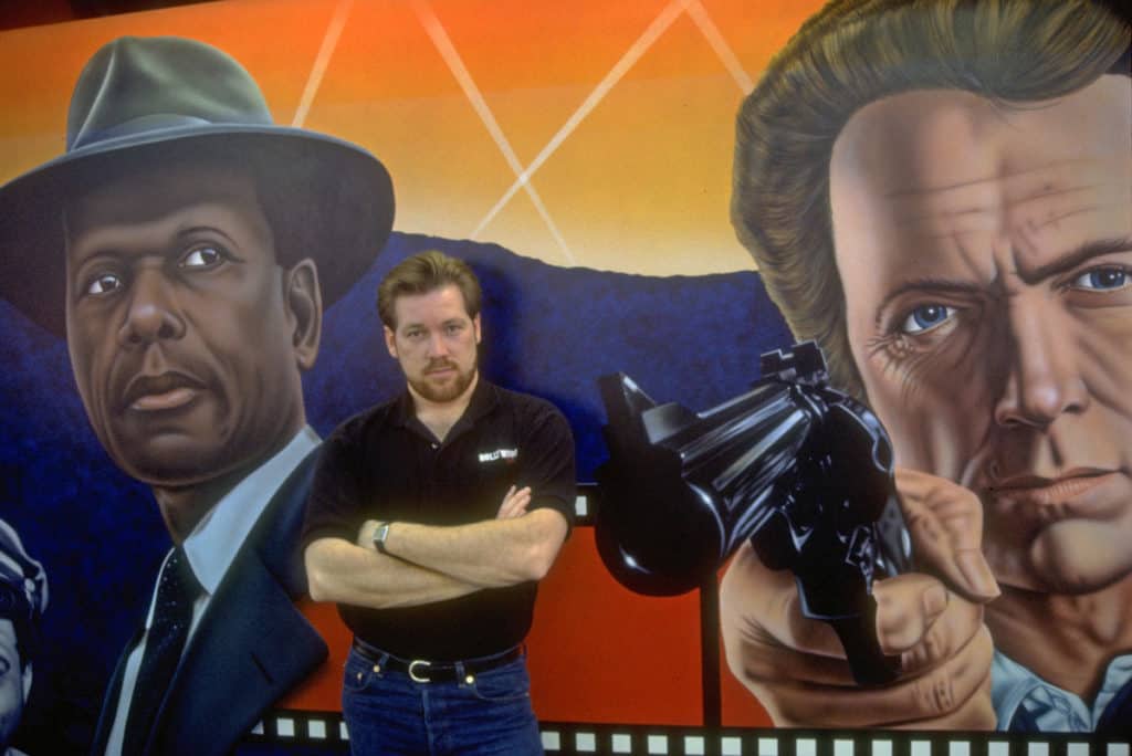 Artist A.D. Cook with Mr. Tibbs and Dirty Harry Hollywood Video mural