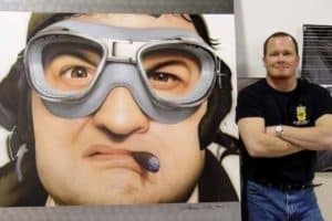 Artist Steve Driscoll with Belushi painting
