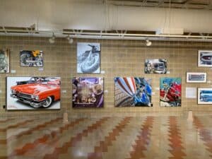 Luster Exhibit with A.D. Cook artworks at Auburn Cord Duesenberg Automobile Museum