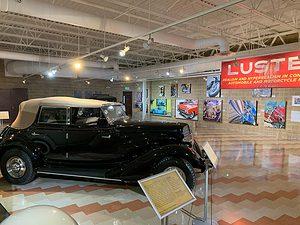 LUSTER Exhibit at Auburn Cord Duesenberg Automobile Museum featuring A.D. Cook Motorcycle Art