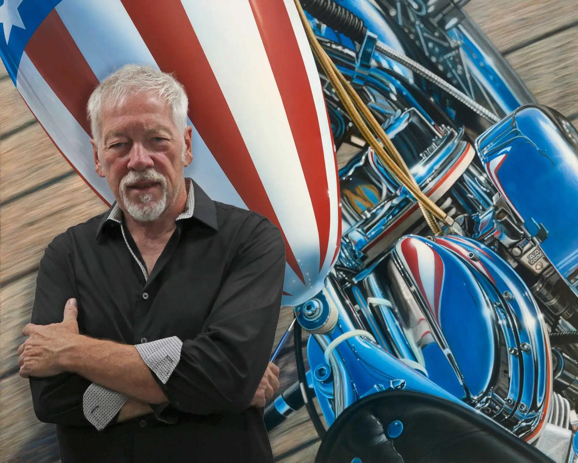 Artist A.D. Cook with America motorcycle painting